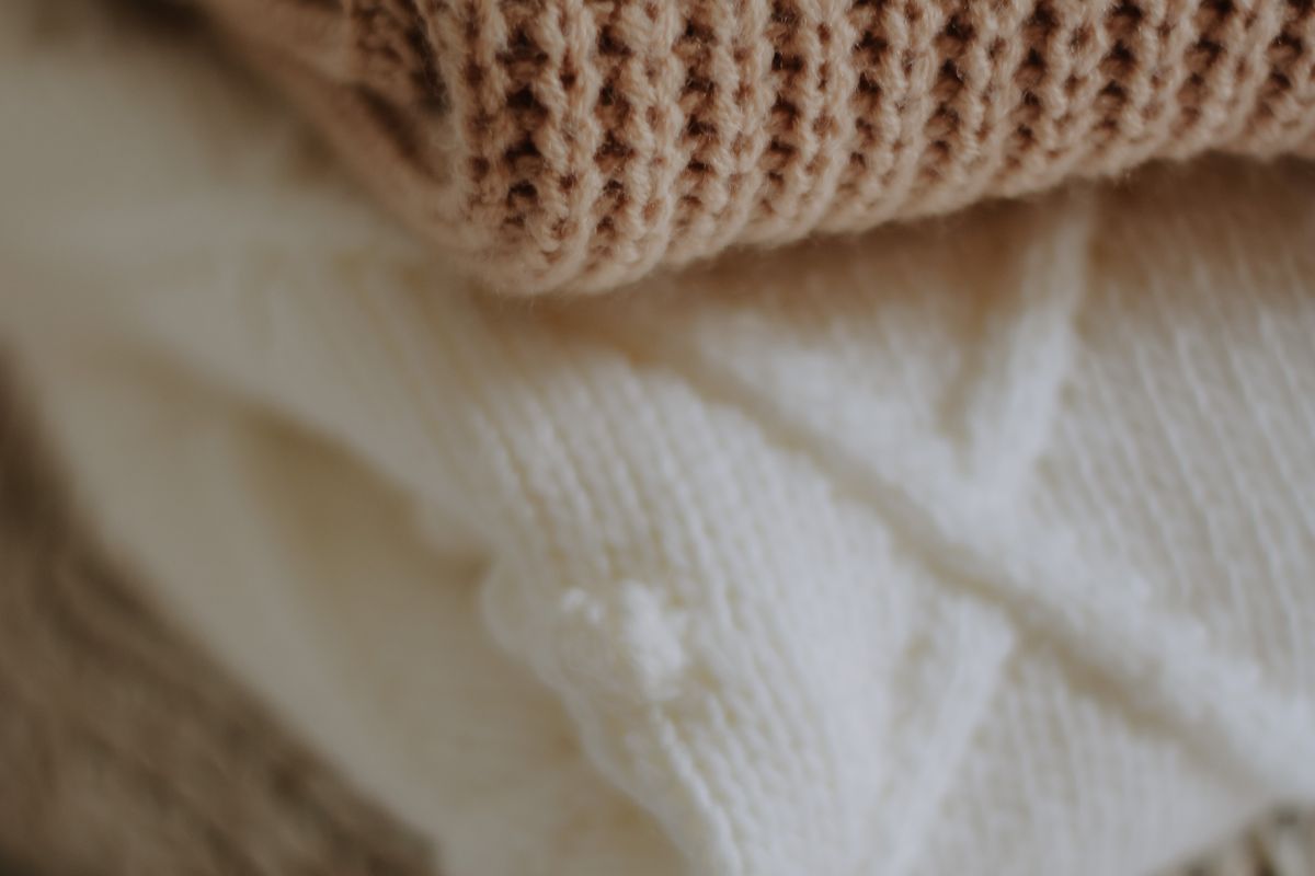 Close view of a fine-gauge merino sweater knit